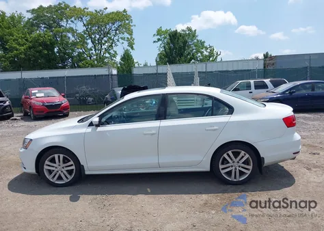 2015 Volkswagen Jetta 1.8T Sel z USA, uszkodzony, nr VIN 3VWL17AJ9FM400023
